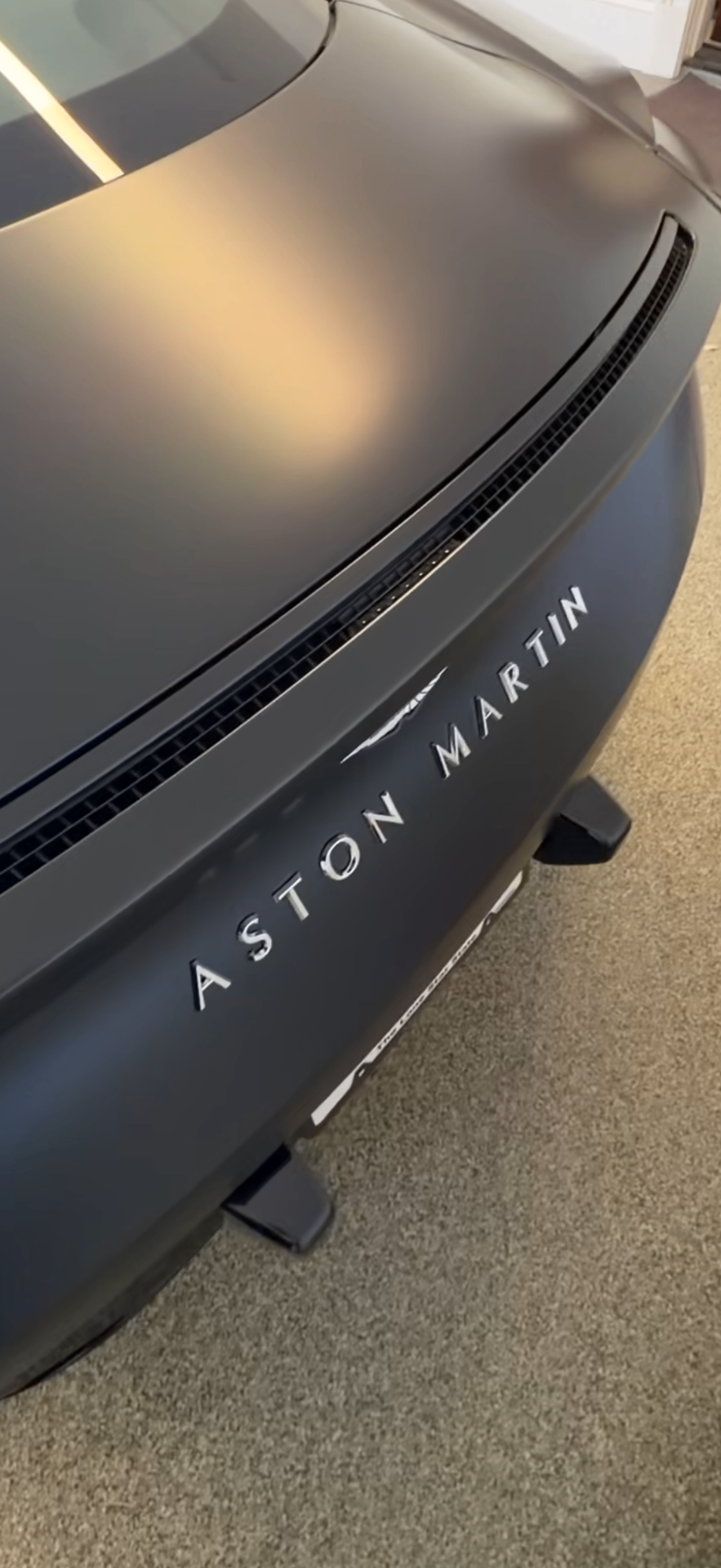 Aston Martin — satin black exterior detail